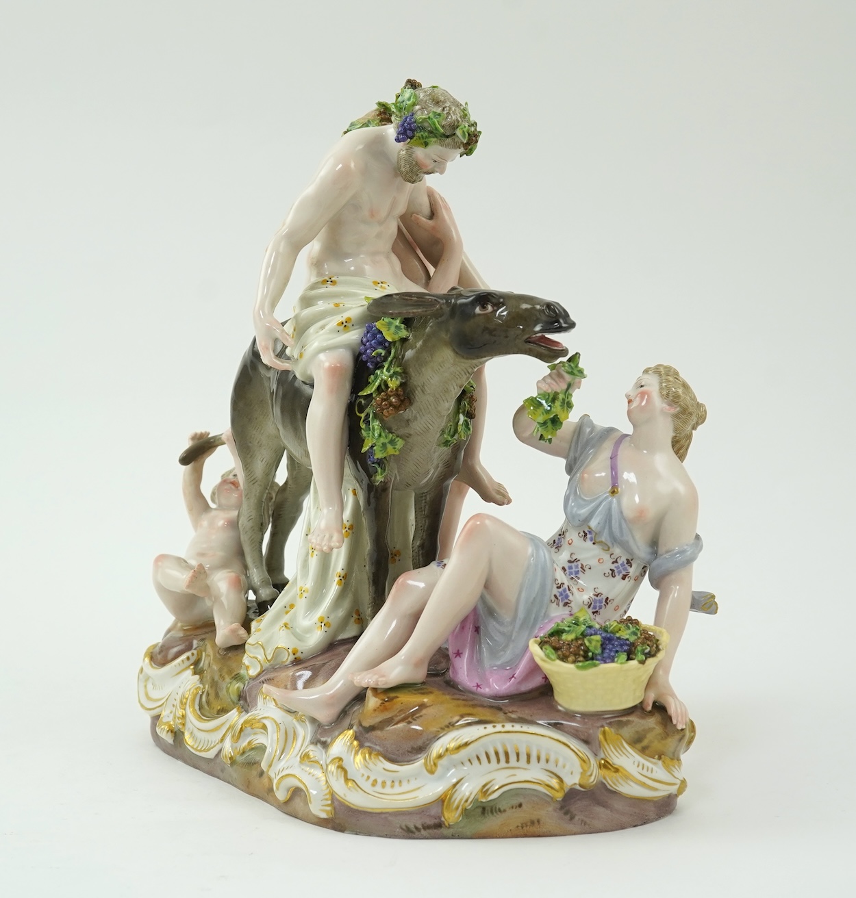 A Meissen figure group of the Drunken Silenus, after a model by J J Kändler, 19th century